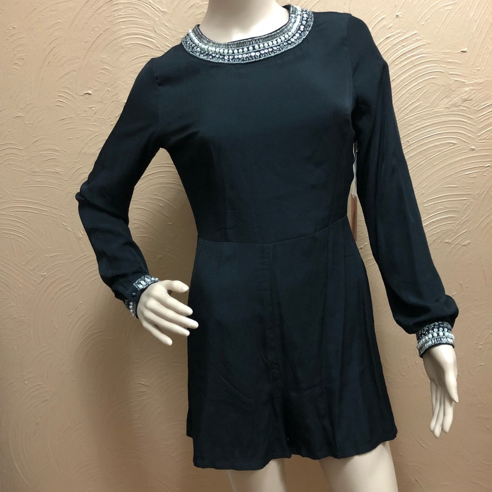 Beautiful romper with pearl